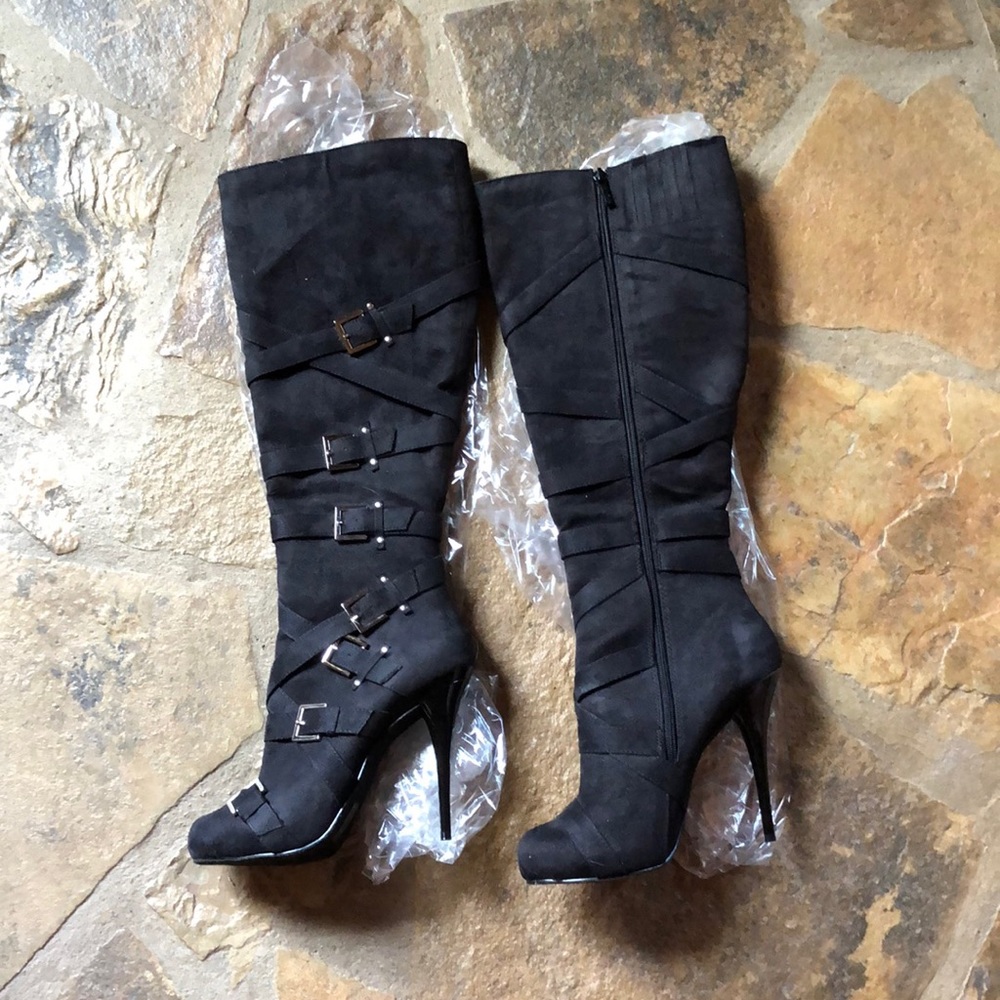 Michael Antonio black knee high boots straps buckles. Excellent condition.